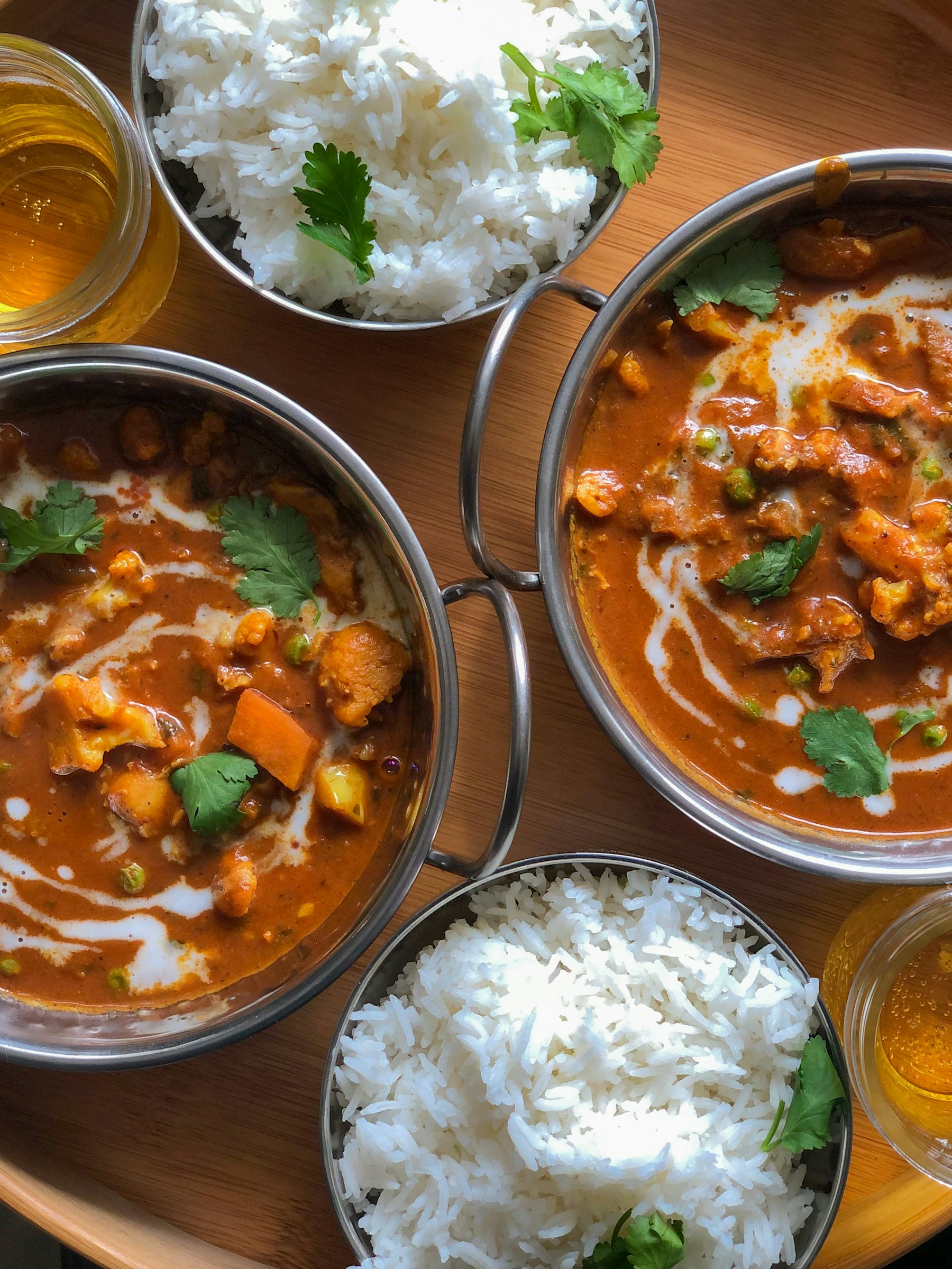 Freshly cooked butter chicken curry with coriander